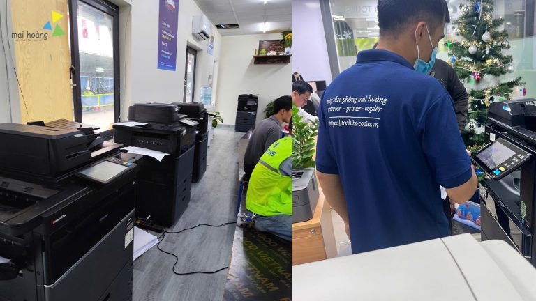 Kỹ thuật viên Mai Hoàng kiểm tra và hỗ trợ sử dụng máy photocopy tại văn phòng